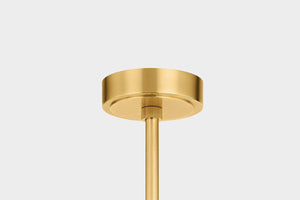 Close-up of the Edgemere Pendant 11" in aged brass showing the shade shape and metal detail.