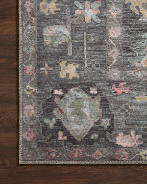 Elysium Charcoal / Multi shown in a curated living room setting at Laurie Yapp Home.