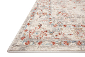 Side view of the Estelle Ivory / Rust rug.