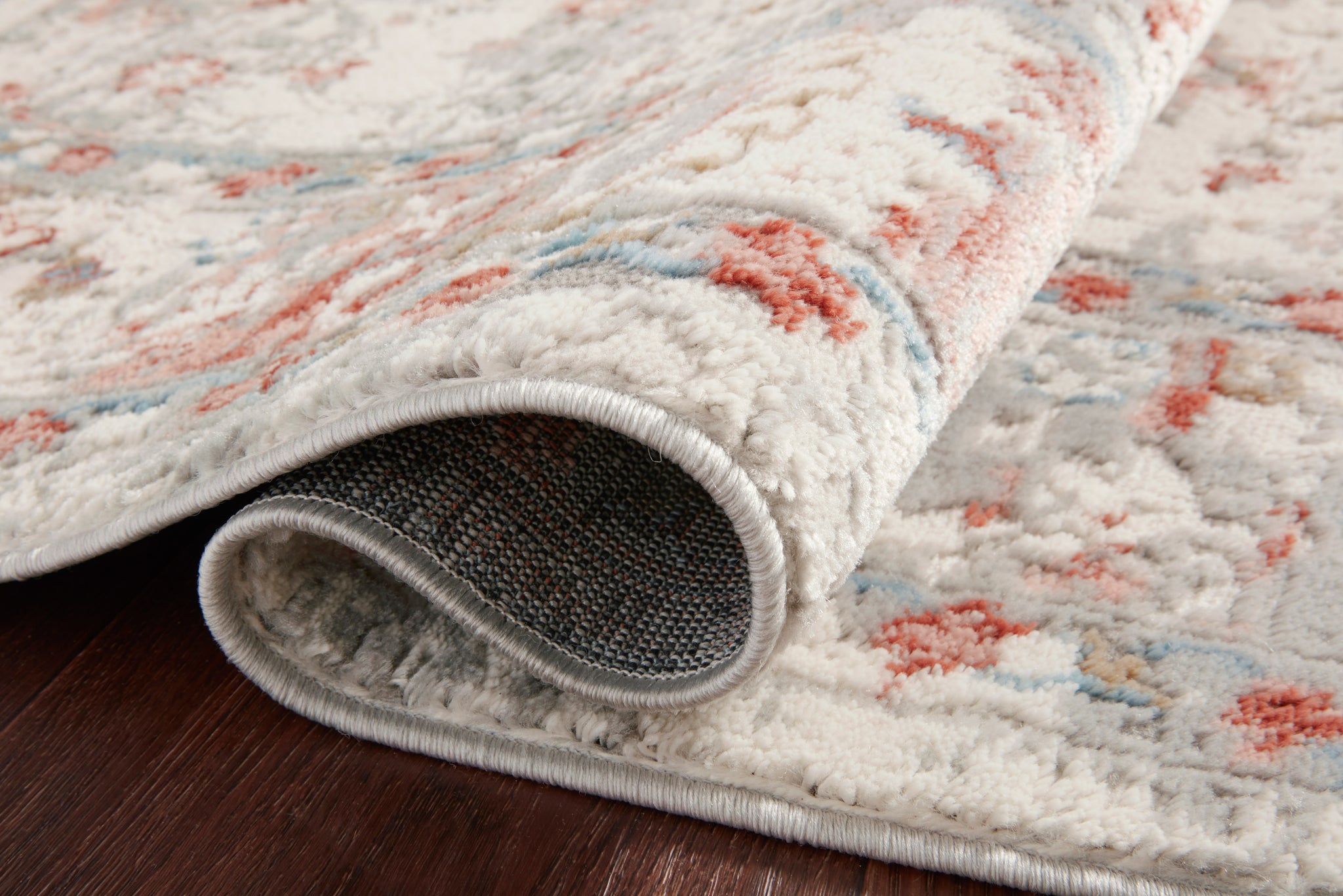 Estelle Ivory / Rust styled in a living room at Laurie Yapp Home.