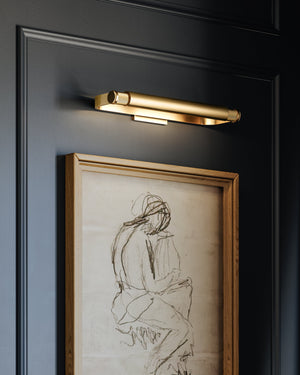 Close-up of the Elm Park Picture Light 24" in aged brass showing the arm curve and shade proportion.
