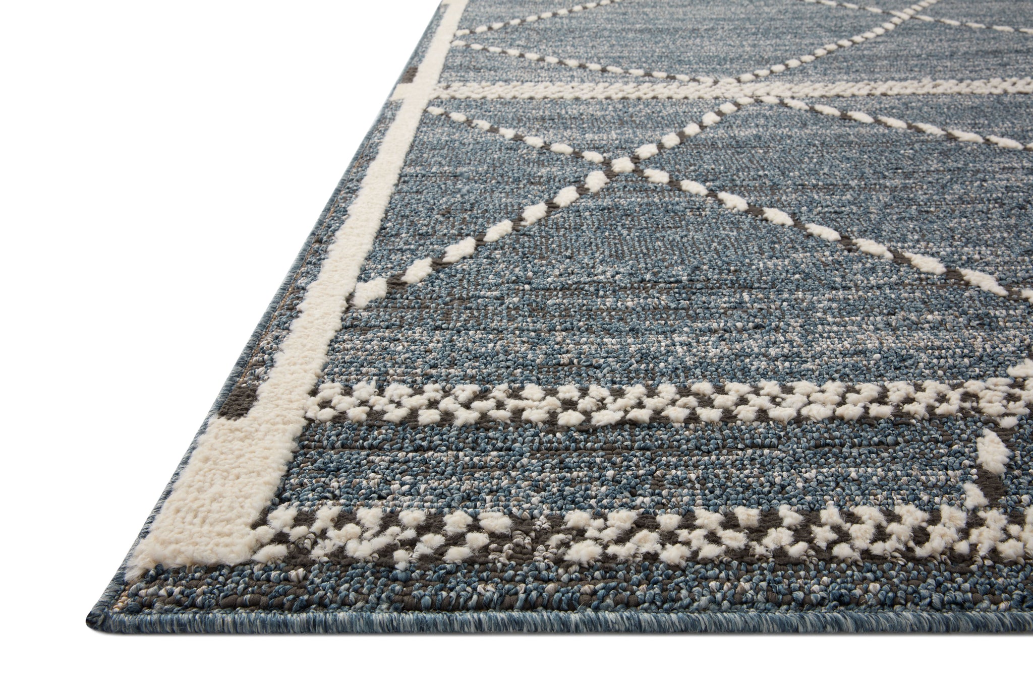 Side view of the Fabian Denim / Charcoal rug.