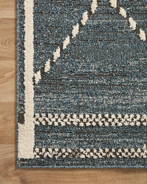 Fabian Denim / Charcoal styled in a living room at Laurie Yapp Home.