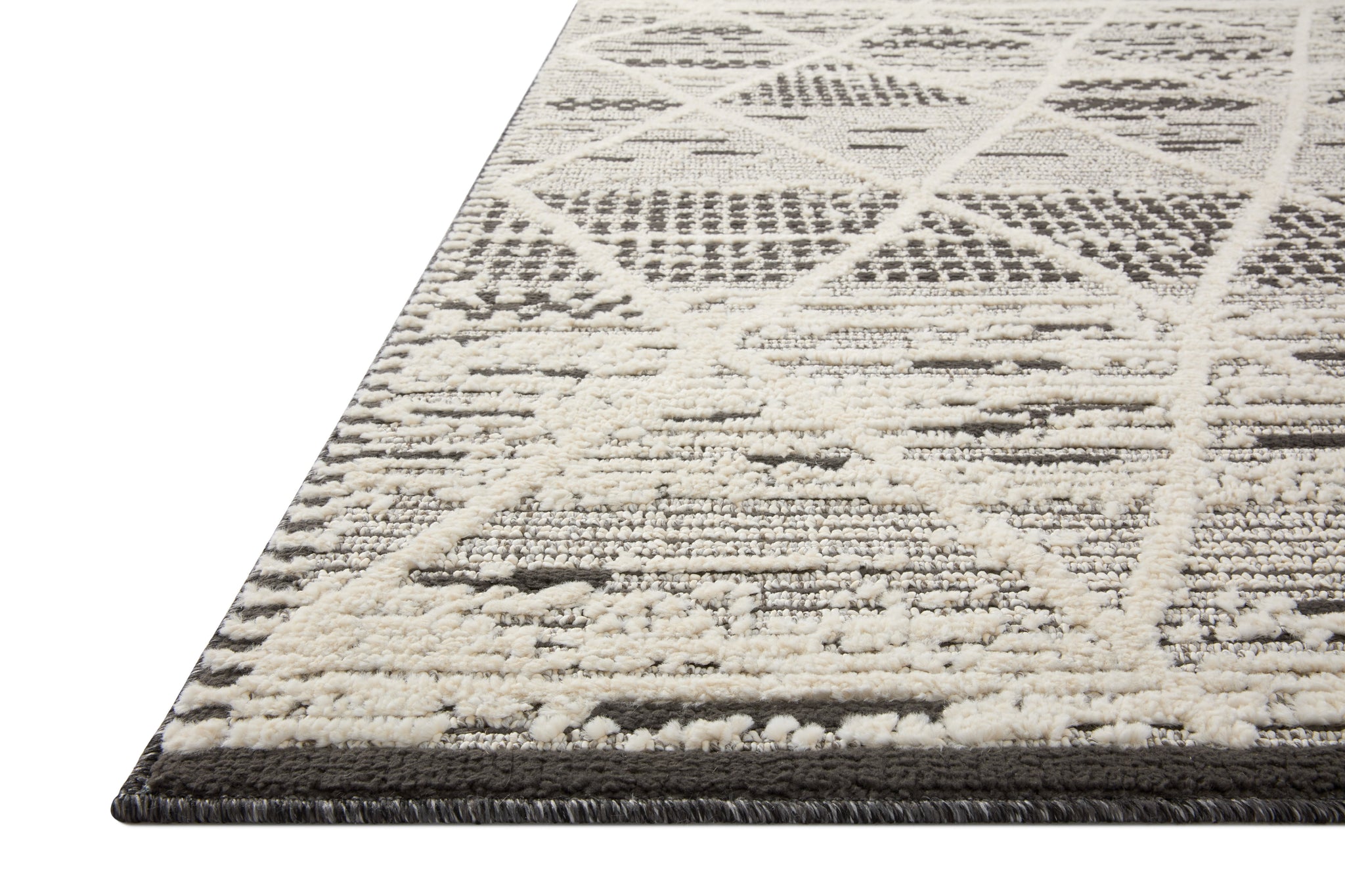 Side view of the Fabian Charcoal / Ivory (Pattern 3) rug.