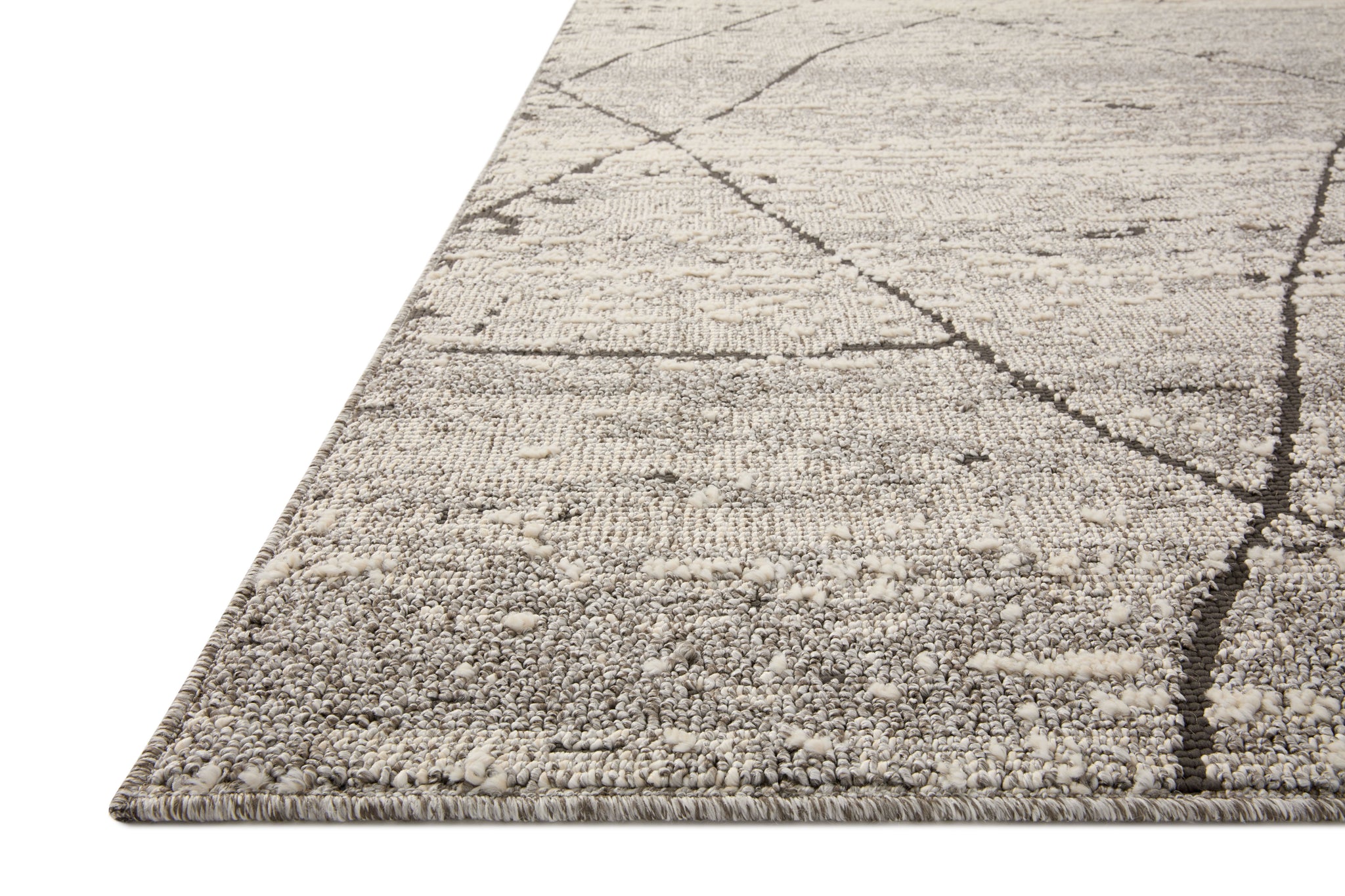 Side view of the Fabian Grey / Charcoal rug.