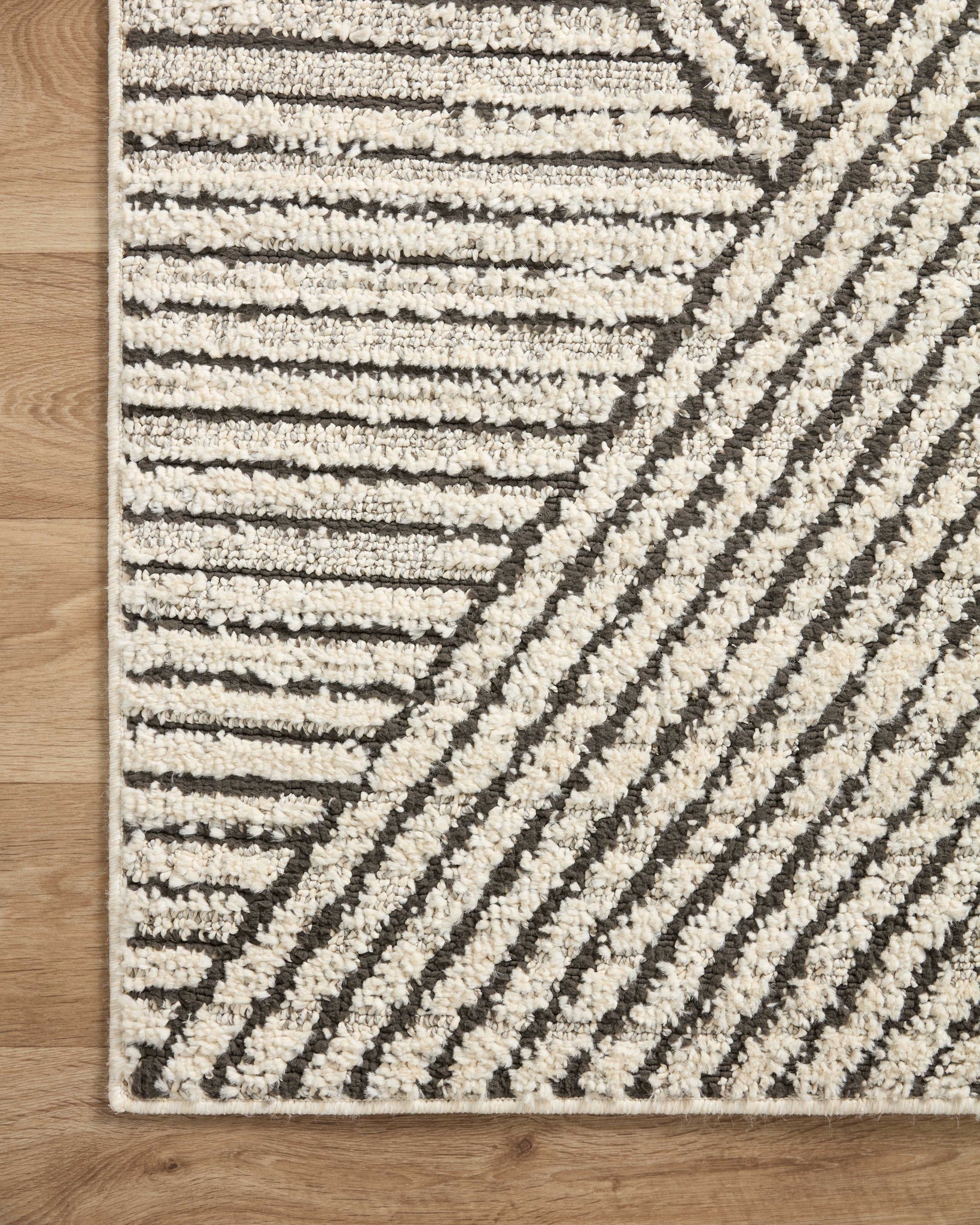 Fabian Charcoal / Ivory (Pattern 6) styled in a living room at Laurie Yapp Home.