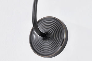 Gladstone Wall Sconce in dark bronze shown from the front to reveal the arm curve and shade silhouette.