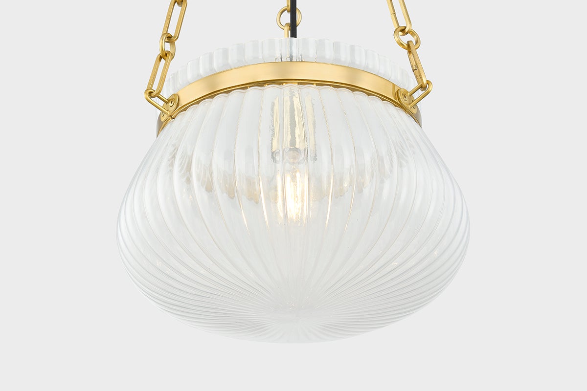 Close-up of the Granby Pendant 13" in aged brass showing the shade shape and metal detail.