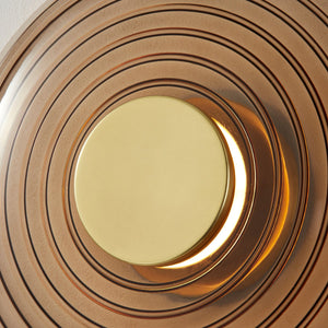 Griston Wall Sconce 12" x 12" in aged brass shown from a second angle to highlight the arm curve and shade silhouette.