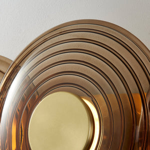 Griston Wall Sconce 12" x 25.75" in aged brass shown from the front to reveal the arm curve and shade silhouette.