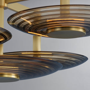 Griston Semi Flush 28" in aged brass shown from the front to reveal the shade profile and mounting canopy.