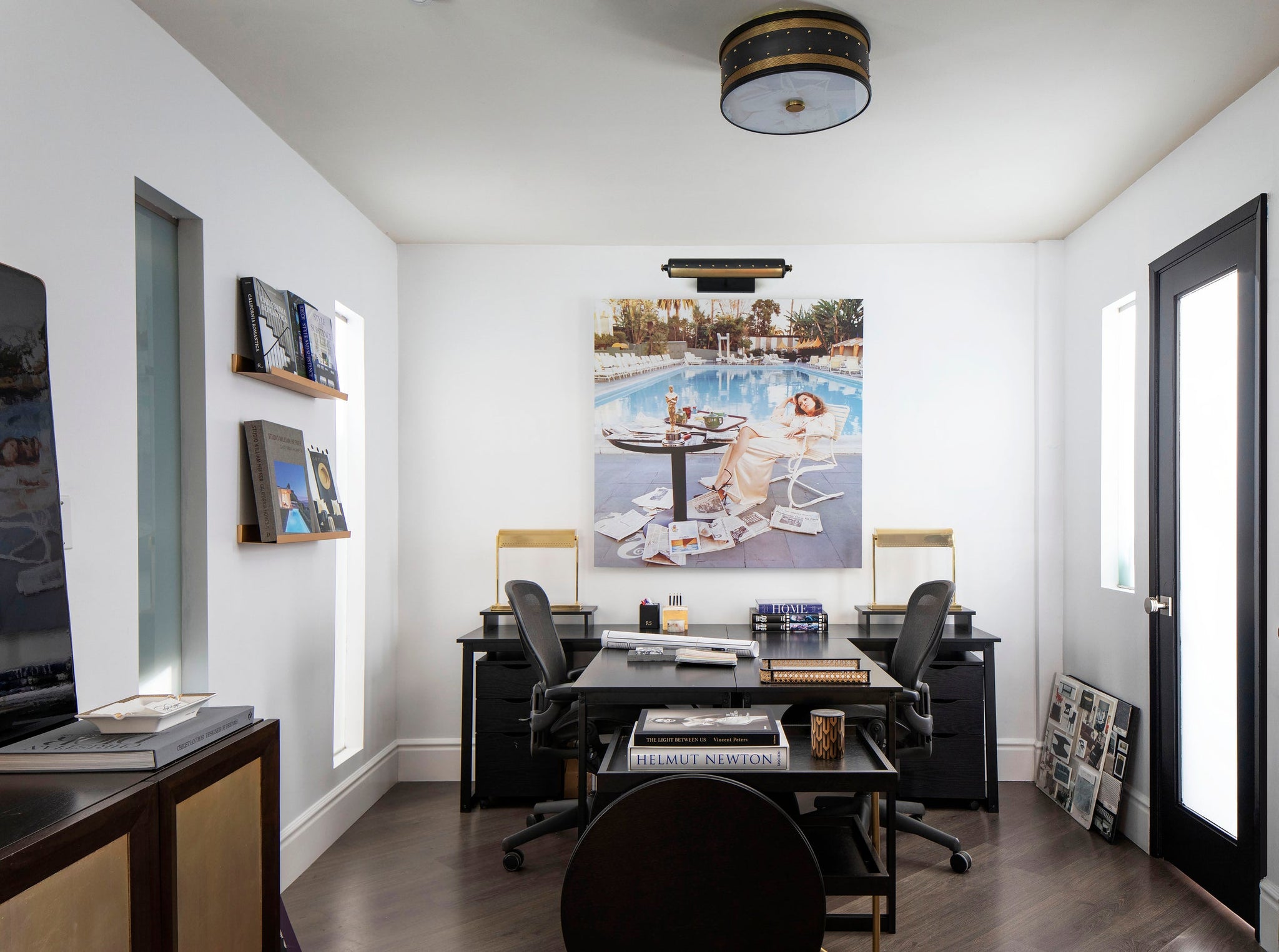 Gaines Picture Light 18.25" in aged brass styled in a reading room for warm, layered light at Laurie Yapp Home.