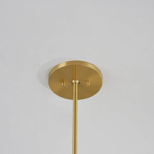 Glenmoore Pendant in aged brass shown from a second angle to highlight the shade shape and metal detail.