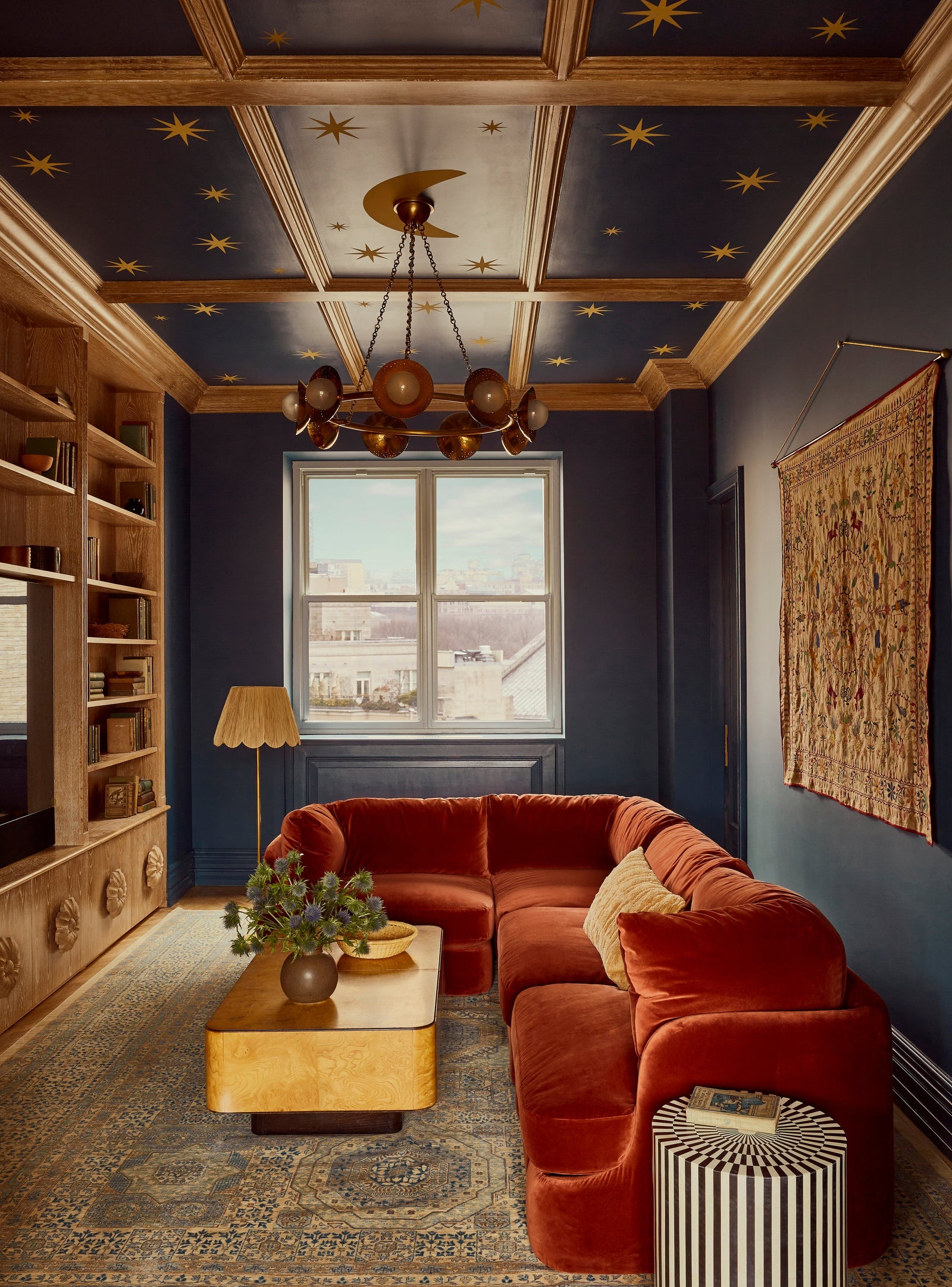 Glimmer Chandelier in aged brass — a Hudson Valley chandelier for dining rooms, entries, and living rooms at Laurie Yapp Home.