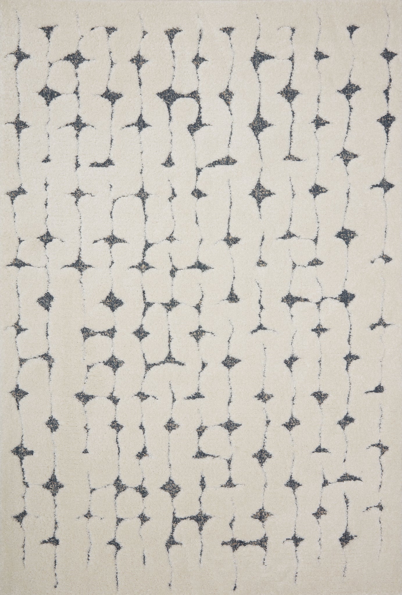 Hagen White / Navy — a Loloi rug at Laurie Yapp Home.