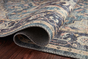 Hathaway Navy / Multi styled underfoot in a layered living room at Laurie Yapp Home.