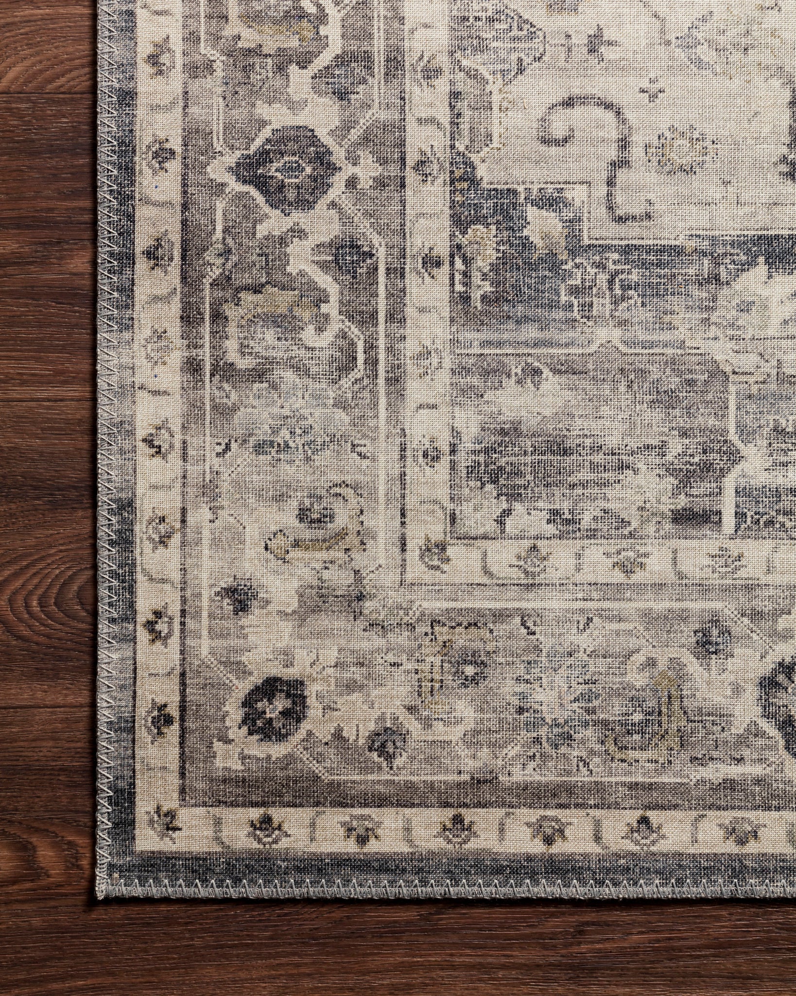 Hathaway Steel / Ivory shown in a curated living room setting at Laurie Yapp Home.