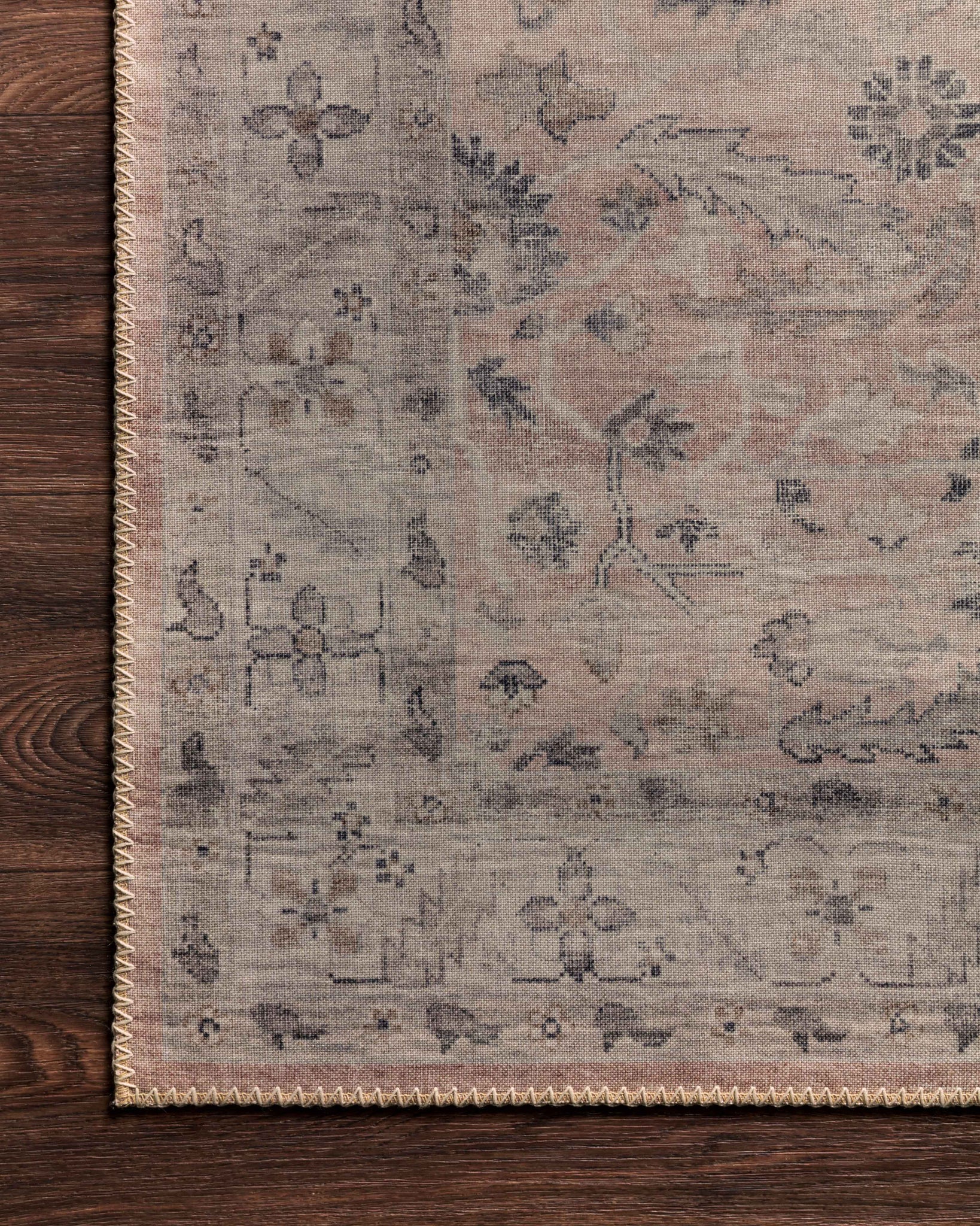 Hathaway Blush / Multi shown in a curated living room setting at Laurie Yapp Home.