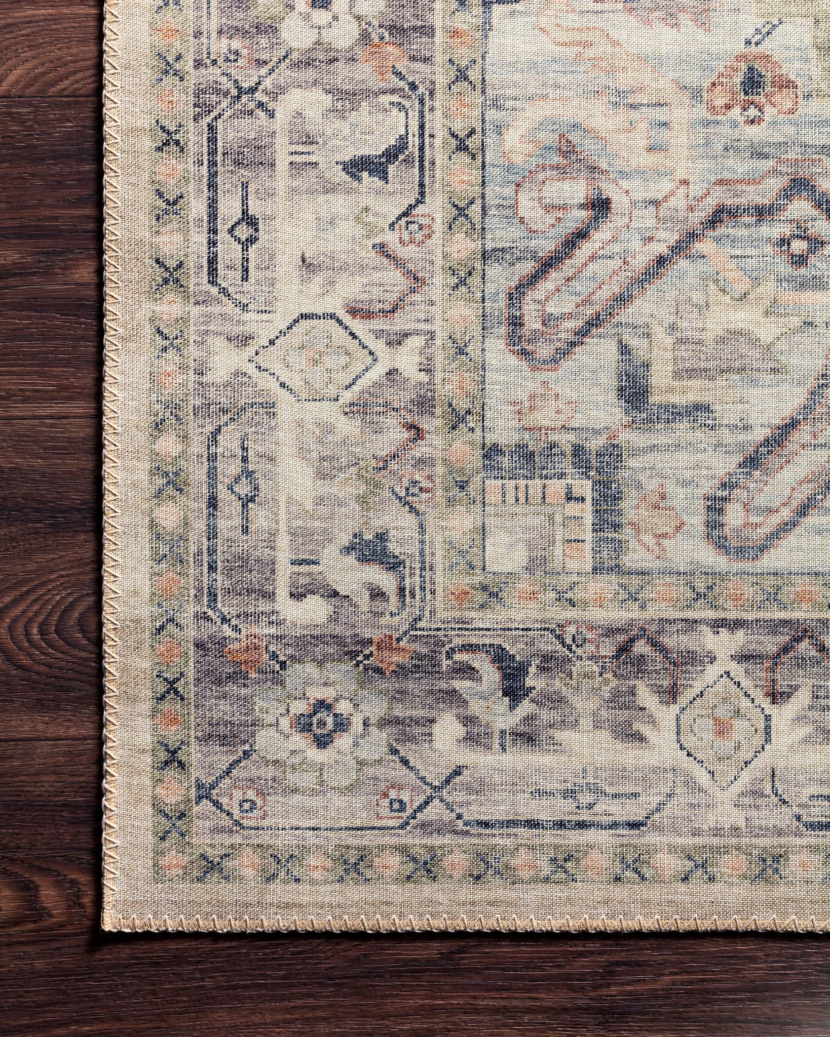 Hathaway Multi / Ivory shown in a curated living room setting at Laurie Yapp Home.