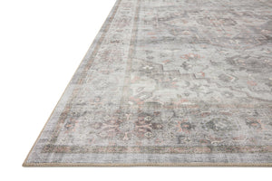 Side view of the Heidi Dove / Blush rug.