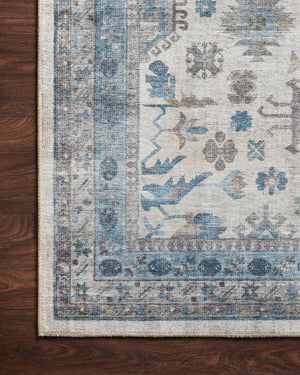 Heidi Ivory / Ocean shown in a curated living room setting at Laurie Yapp Home.