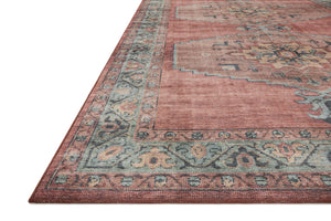 Side view of the Heidi Spice / Aqua rug.