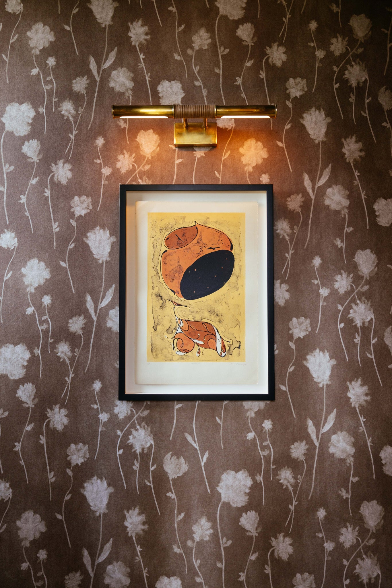 Hallstead Picture Light 18" in aged brass styled in a gallery wall for warm, layered light at Laurie Yapp Home.