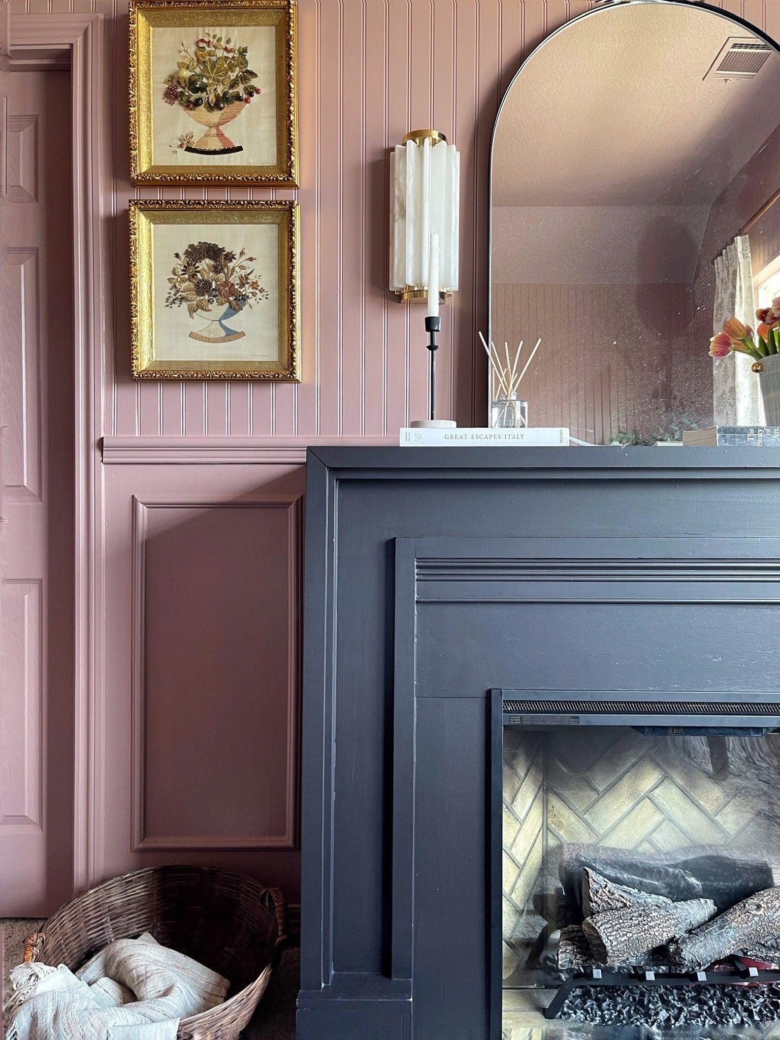 Hillside Wall Sconce 6" x 13.5" in aged brass styled in a warmly lit hallway for warm, layered light at Laurie Yapp Home.