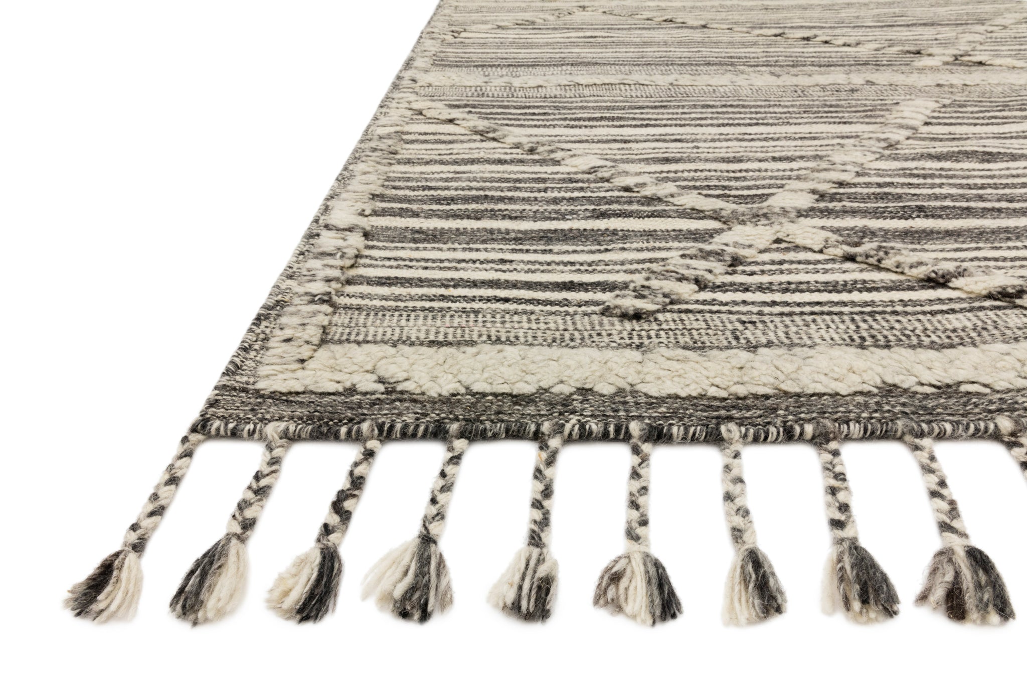 Side view of the Iman Ivory / Charcoal rug.
