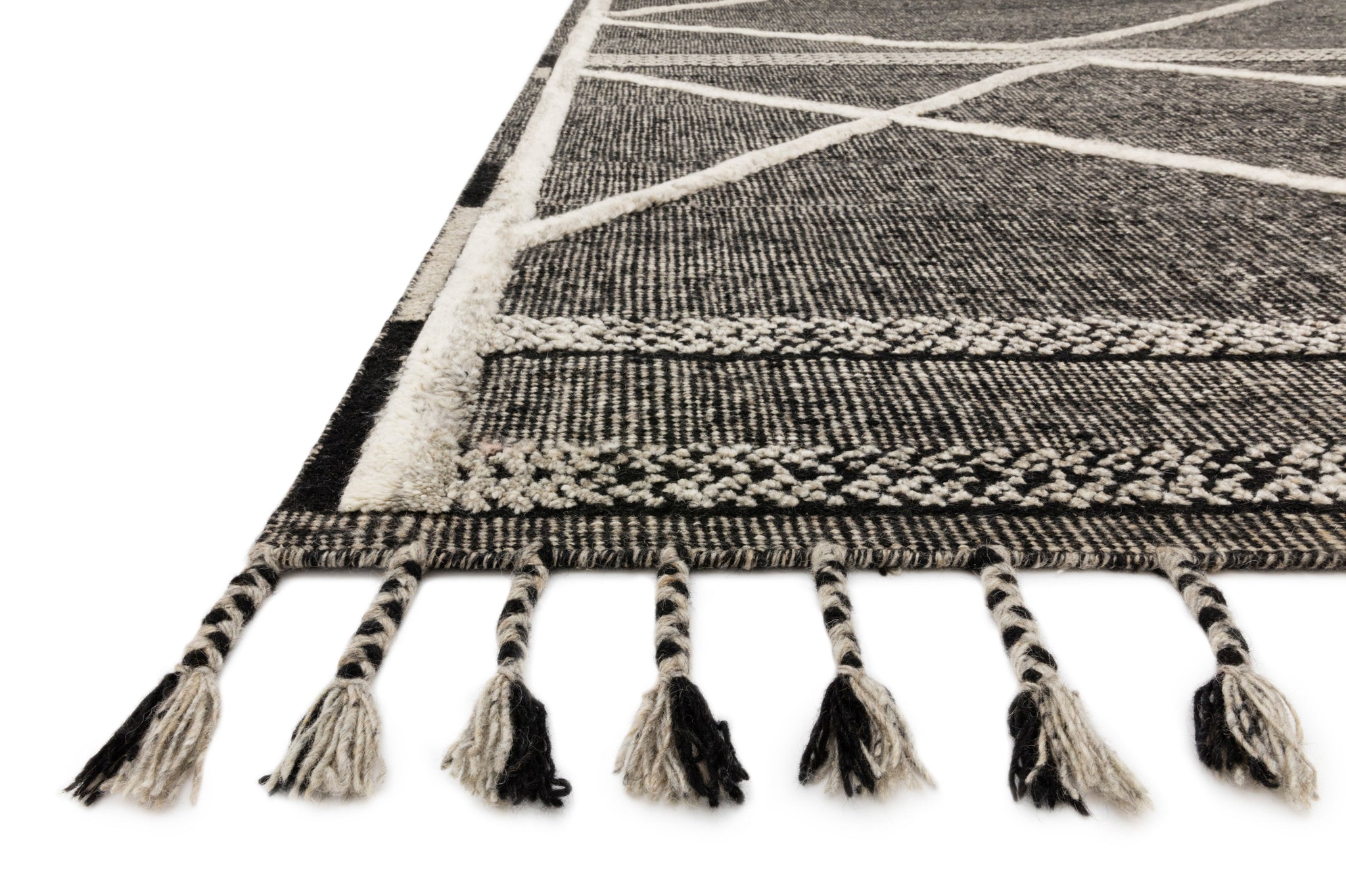 Side view of the Iman Beige / Charcoal rug.