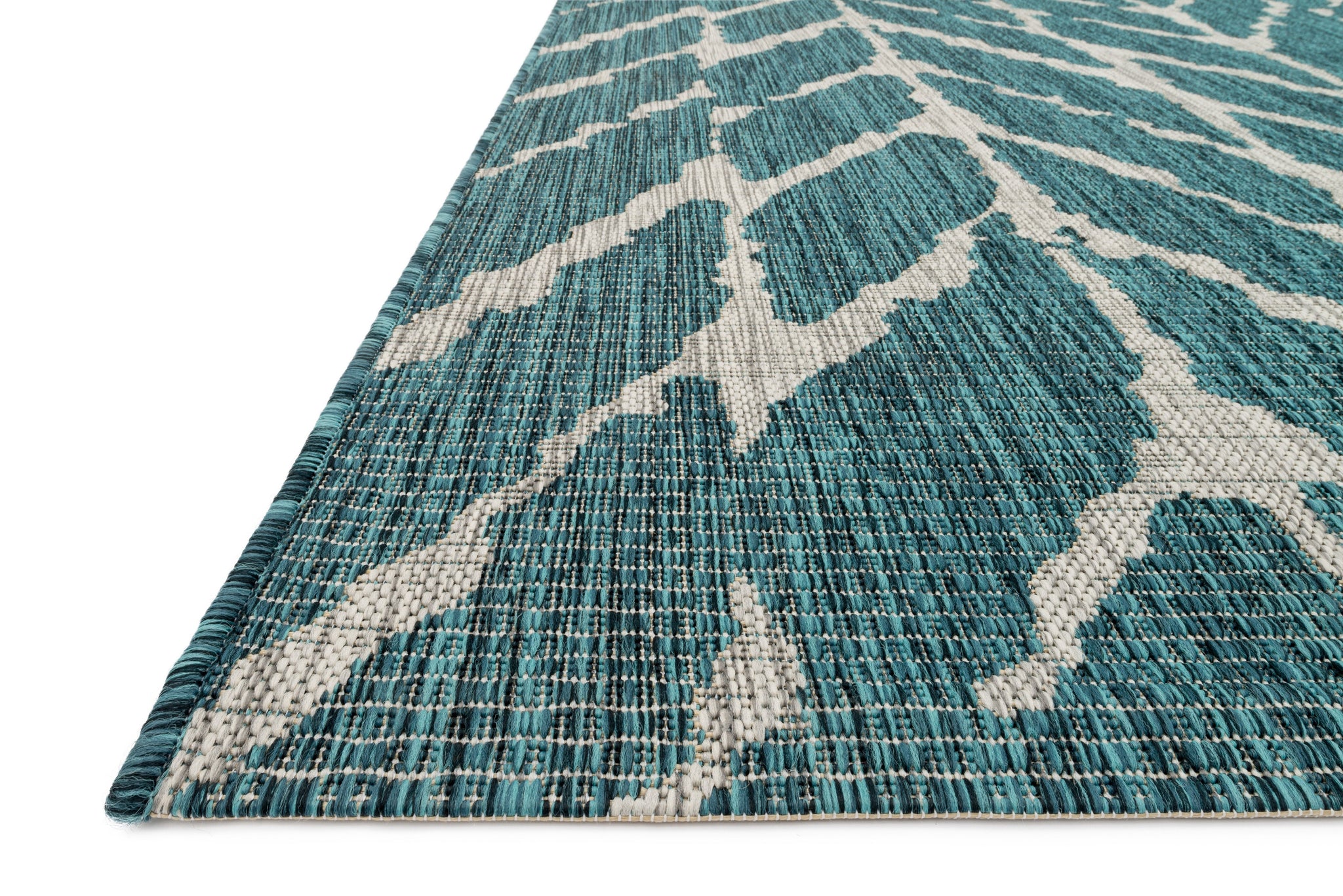 Side view of the Isle Teal / Grey rug.