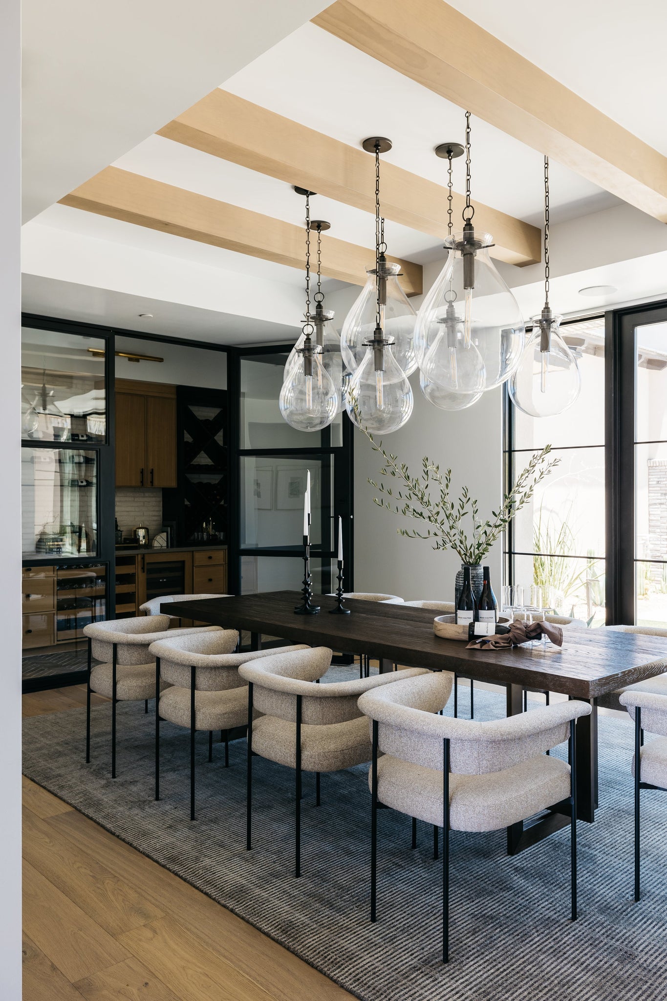 Ivy Pendant 12.5" in bronze styled in an elegant dining room for warm, layered light at Laurie Yapp Home.