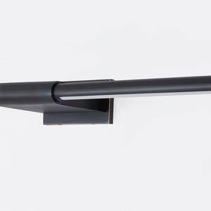 Close-up of the Jerome Picture Light 30" in bronze showing the arm curve and shade proportion.