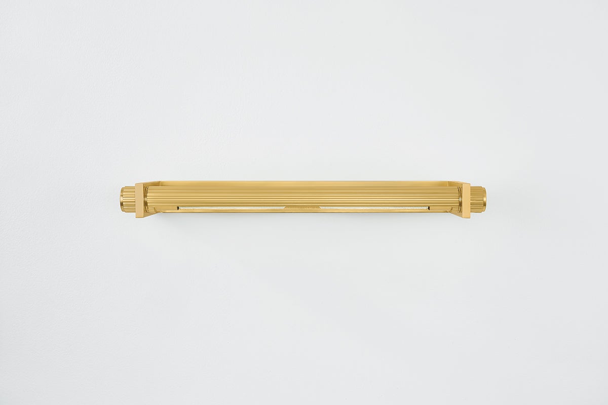 Judd Picture Light 26.5" in aged brass shown from the front to reveal the arm curve and shade proportion.