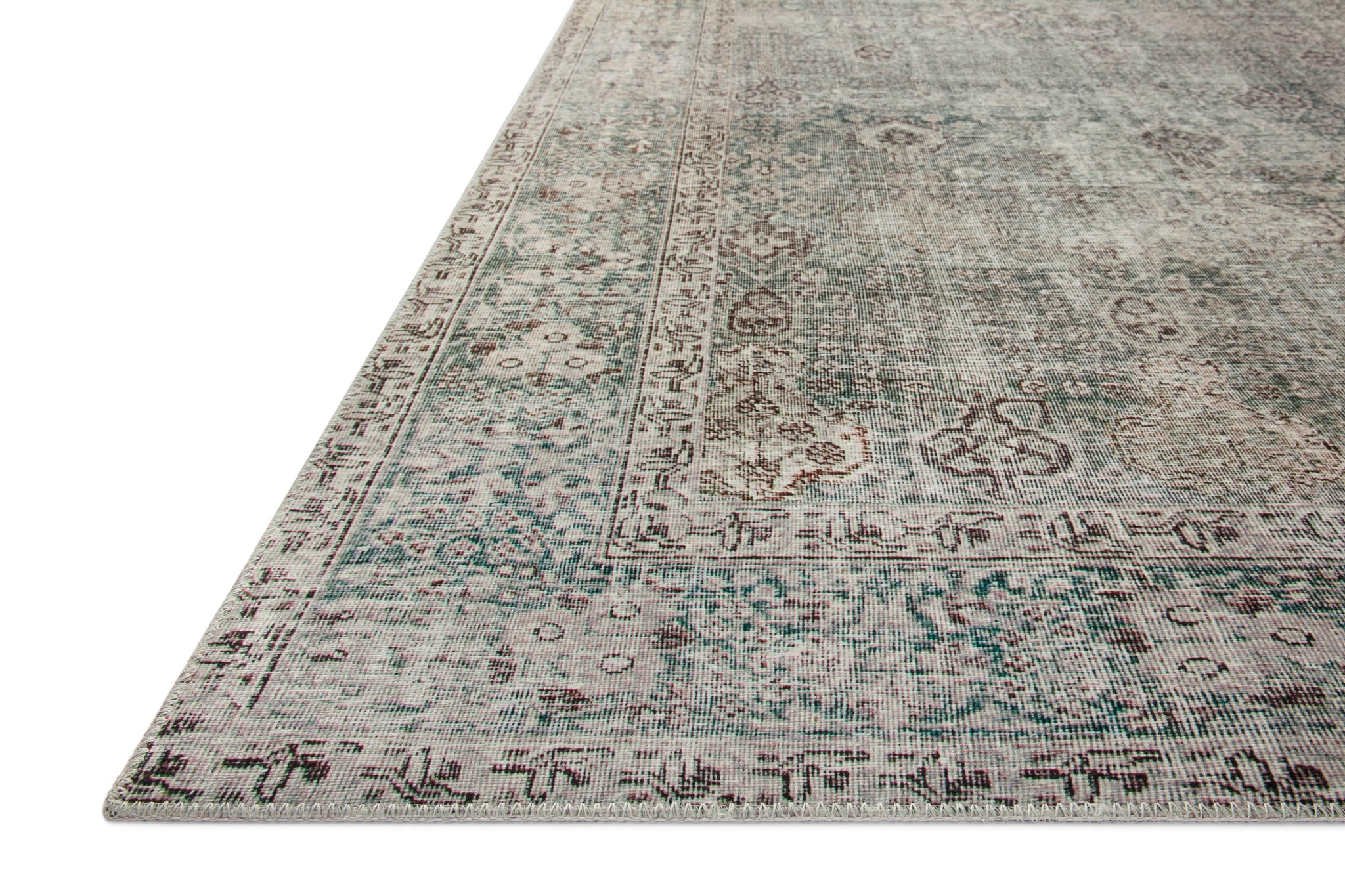 Jules Emerald / Antique Ivory shown from a different angle to reveal its pattern.