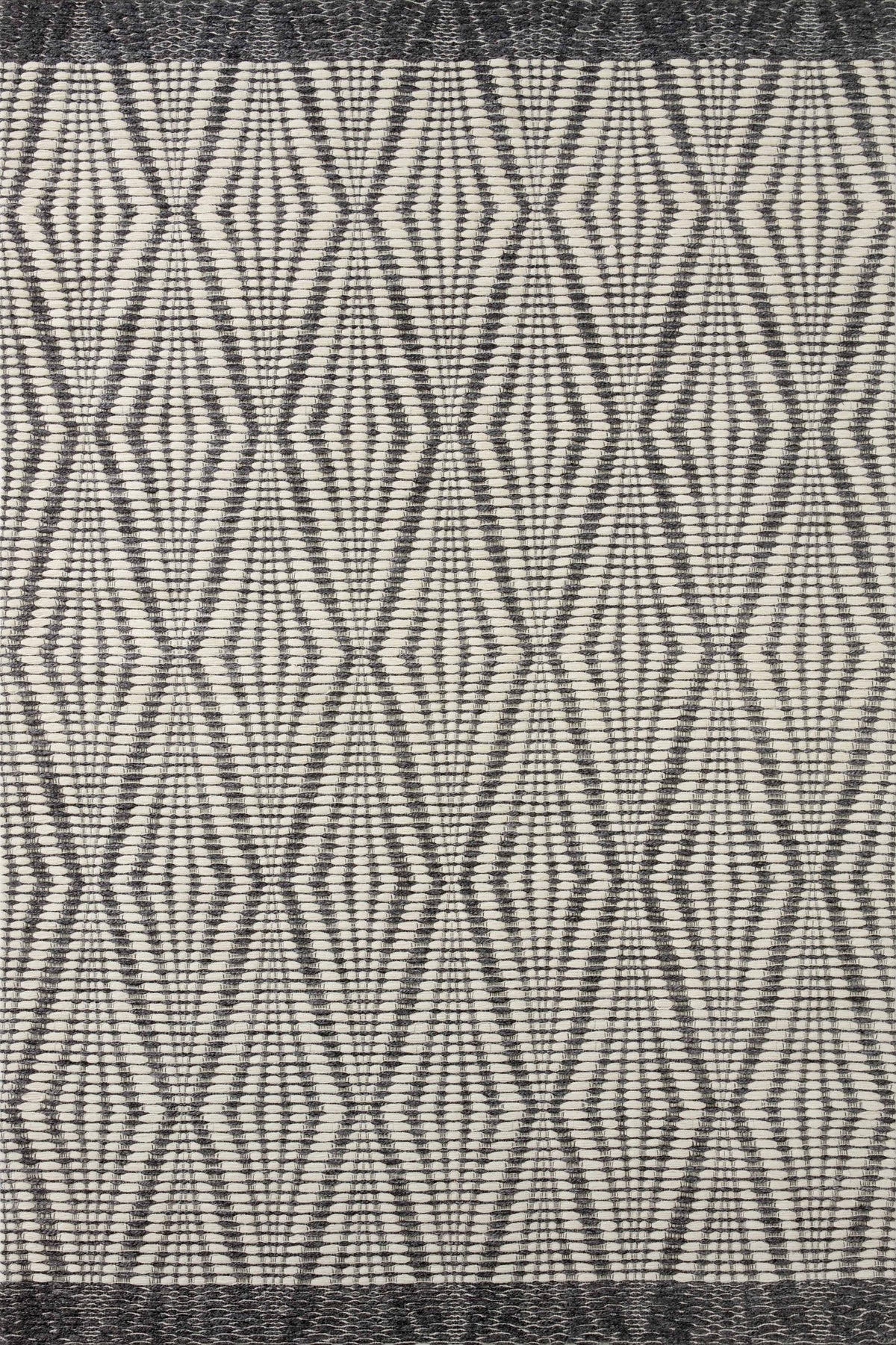 Kenzie Ivory / Charcoal — a Loloi rug at Laurie Yapp Home.