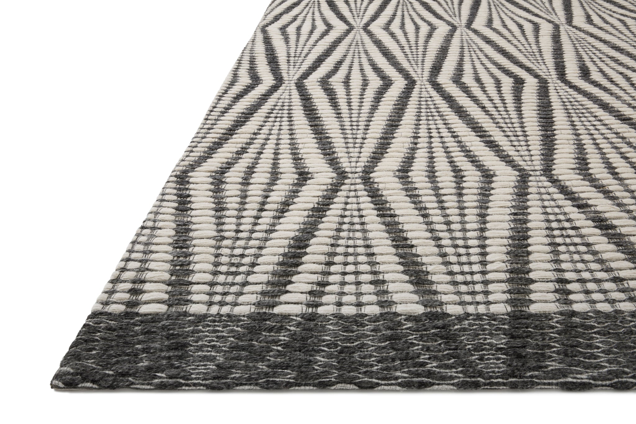 Side view of the Kenzie Ivory / Charcoal rug.