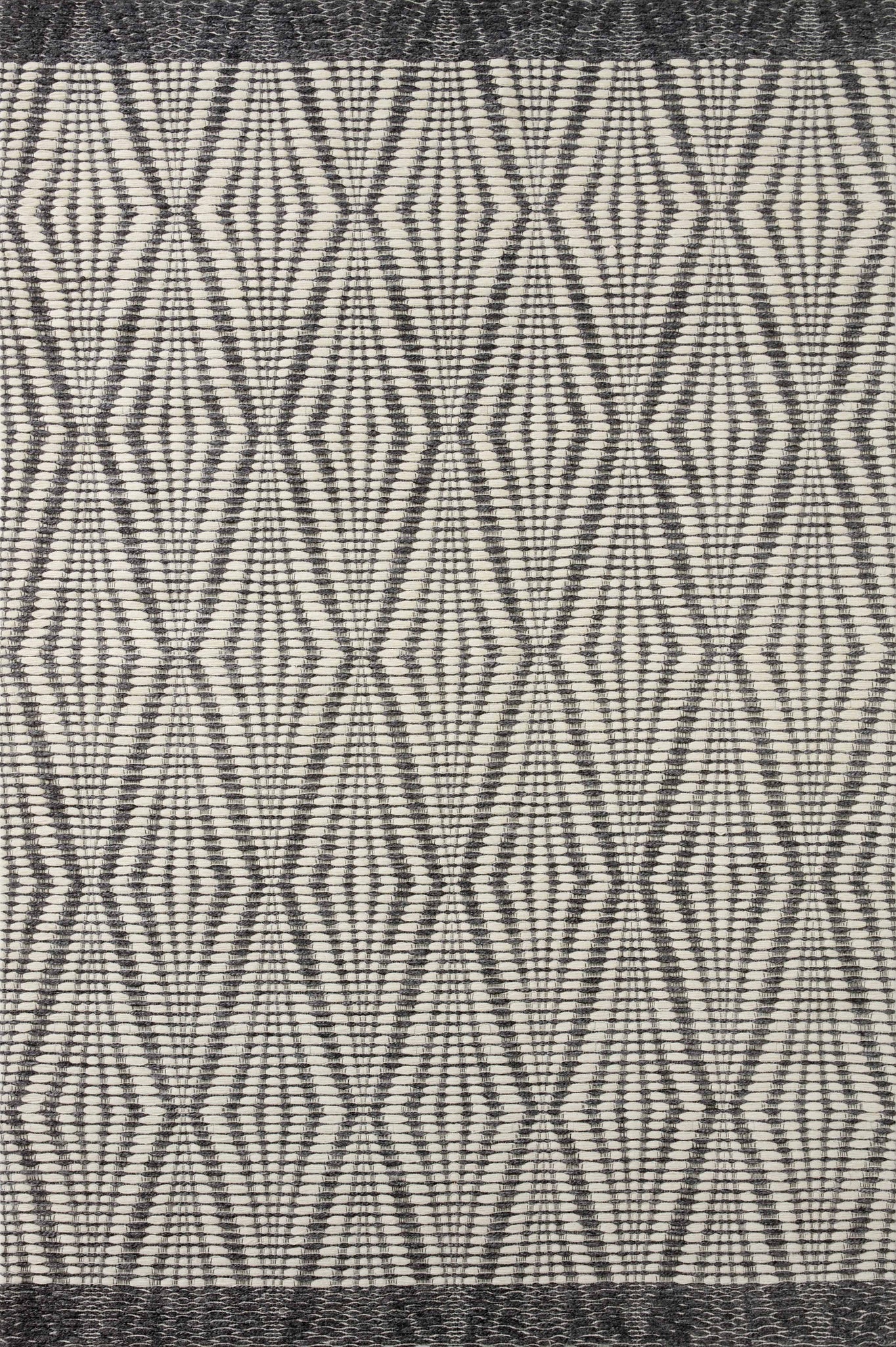 Kenzie Ivory / Charcoal — a Loloi rug at Laurie Yapp Home.