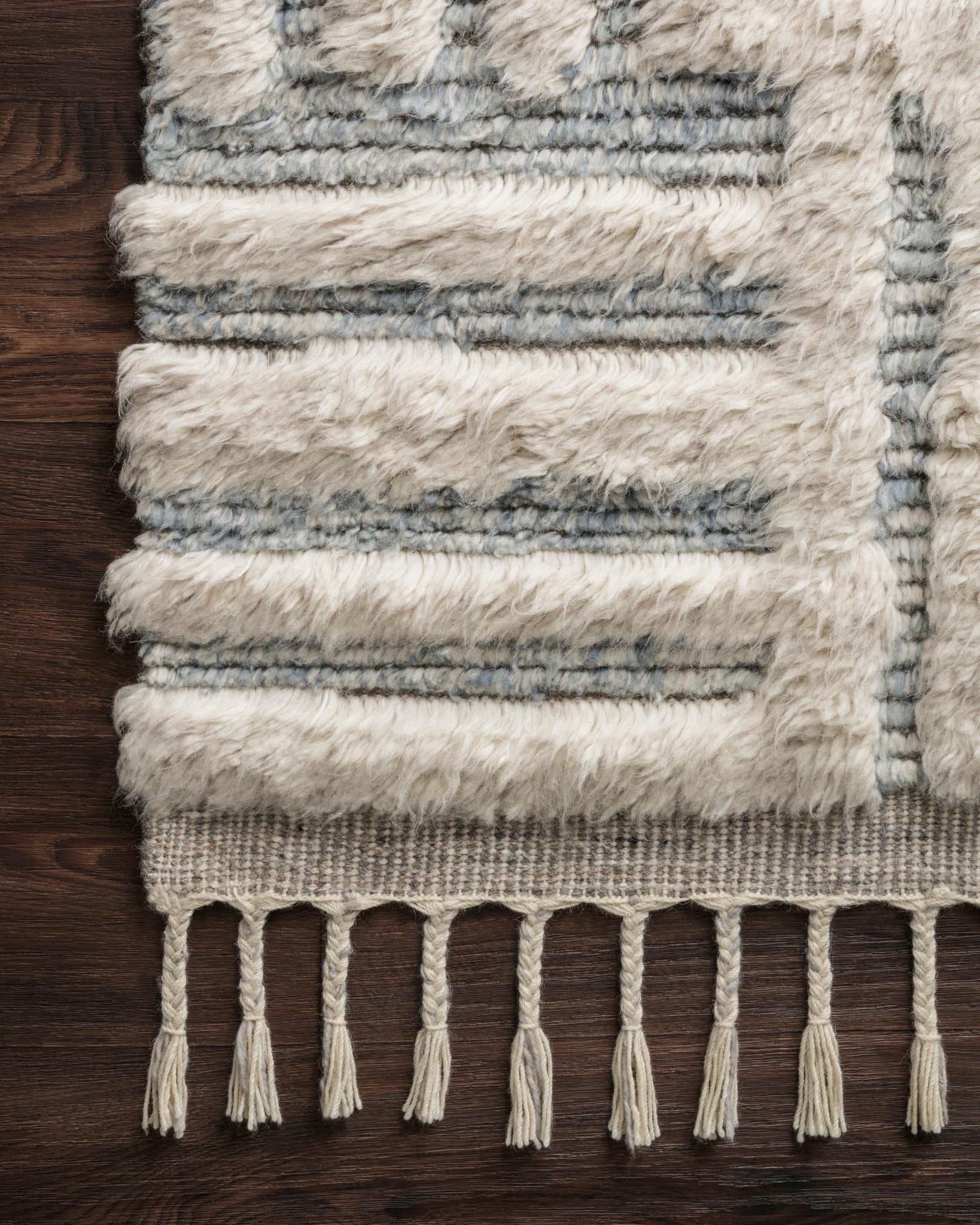 Side view of the Khalid Ivory / Sky rug.
