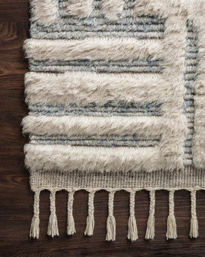 Side view of the Khalid Ivory / Sky rug.
