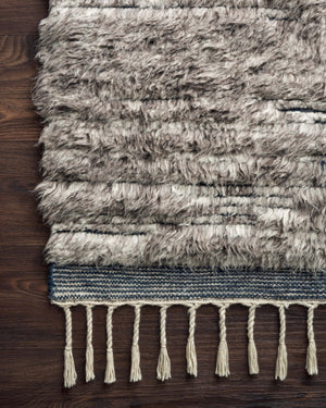 Side view of the Khalid Pewter / Ink rug.