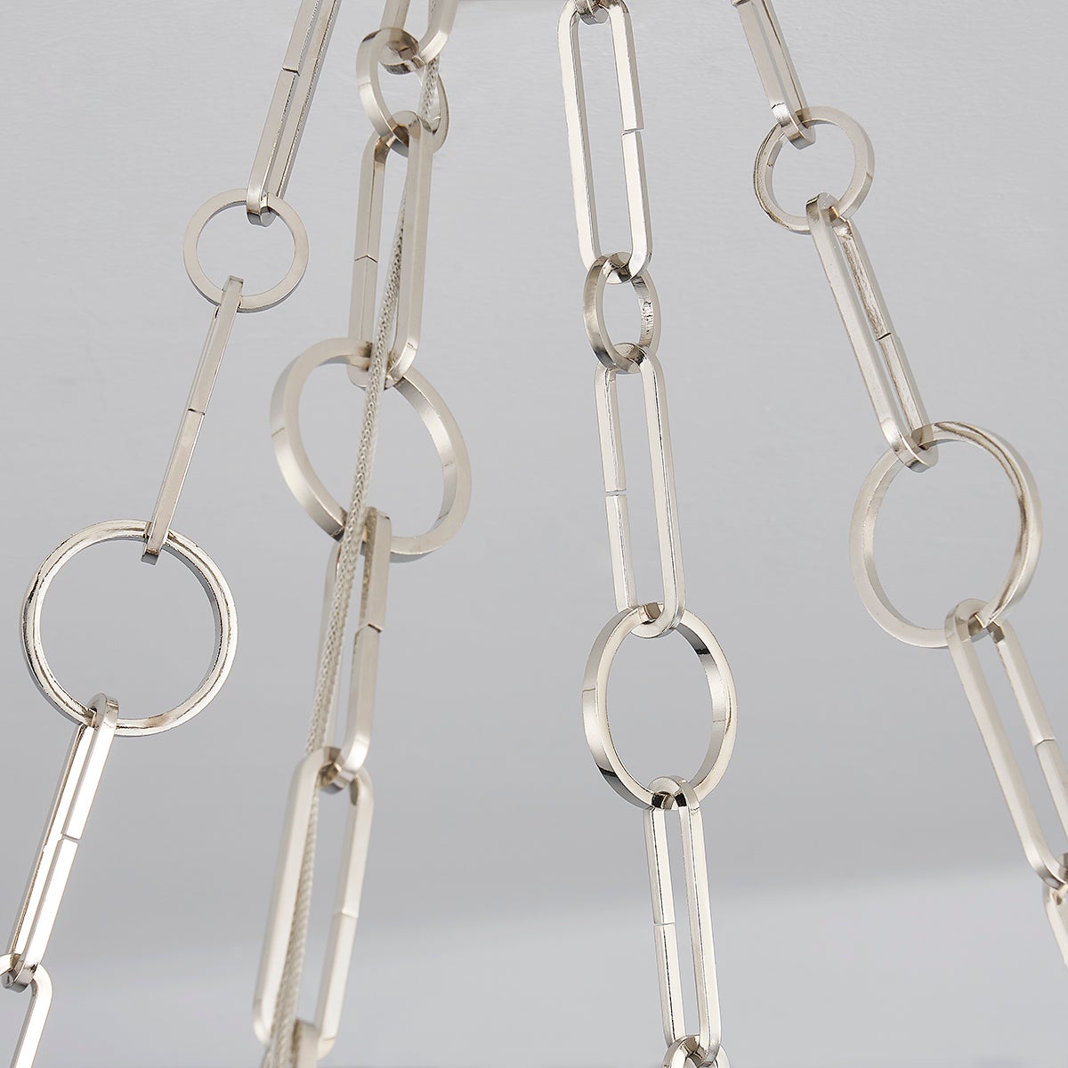 Close-up of the Kirby Chandelier 30" x 3.5" in polished nickel showing the frame, arms, and shade detail.