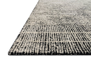 Side view of the Kopa Black / Ivory rug.