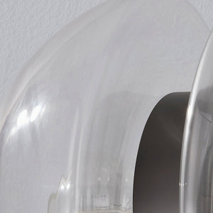 Close-up of the Kert Wall Sconce showing the arm curve and shade silhouette.