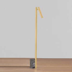 Close-up of the Circleville Floor Lamp in aged brass showing the stem, base, and shade proportions.