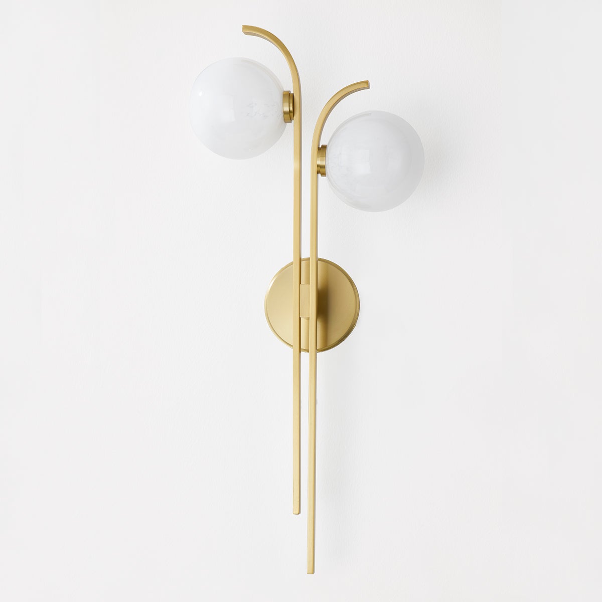 Laval Wall Sconce 10.5" in aged brass shown from a second angle to highlight the arm curve and shade silhouette.