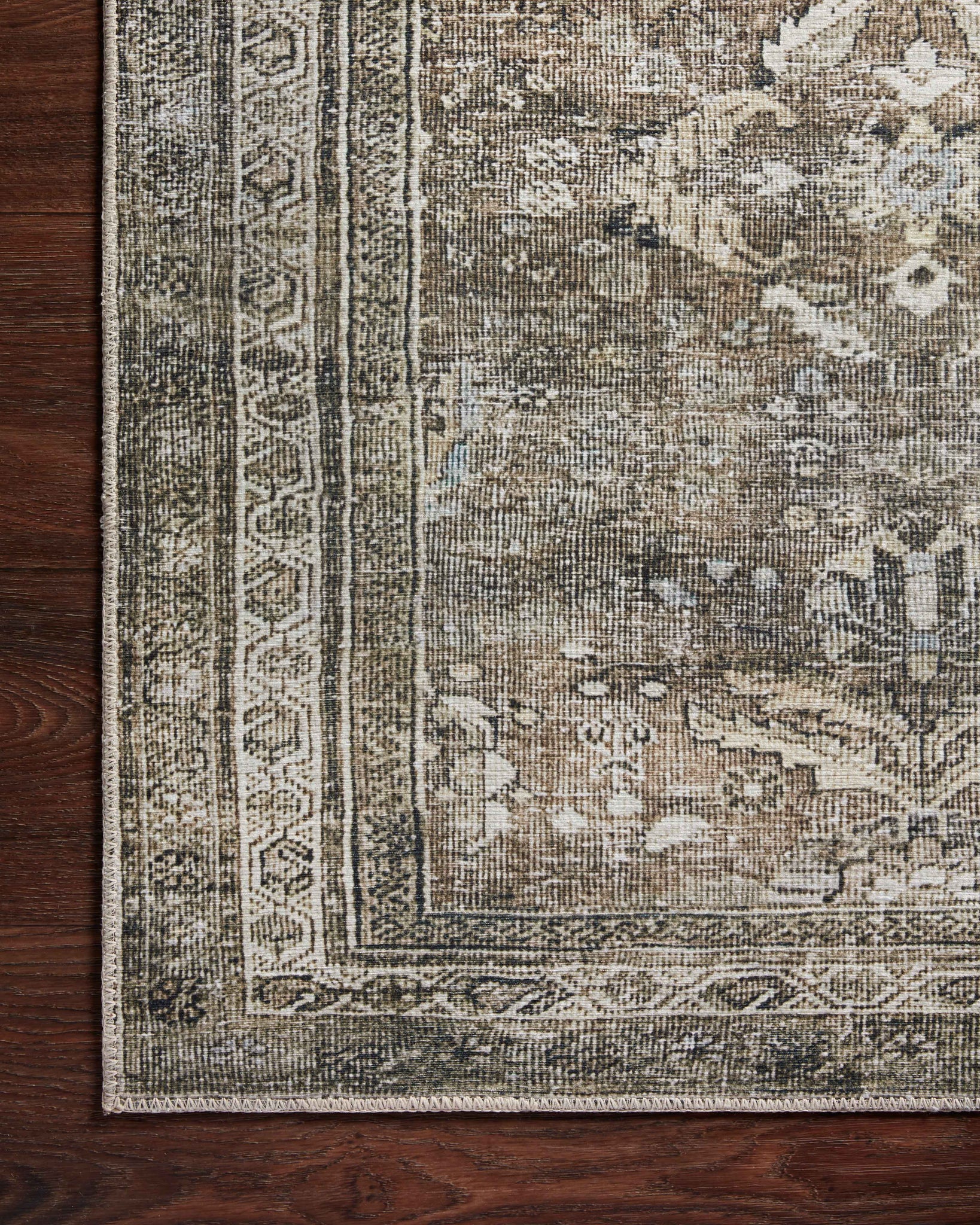 Layla Antique / Moss shown from a different angle to reveal its pattern.