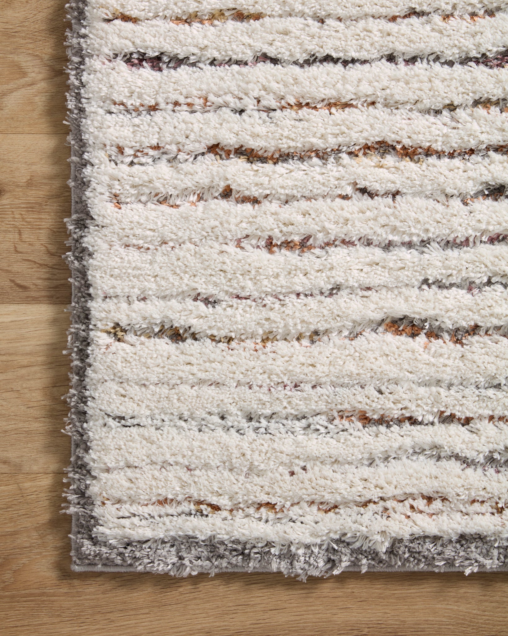 Levitt Shag Ivory / Multi shown from a different angle to reveal its pattern.