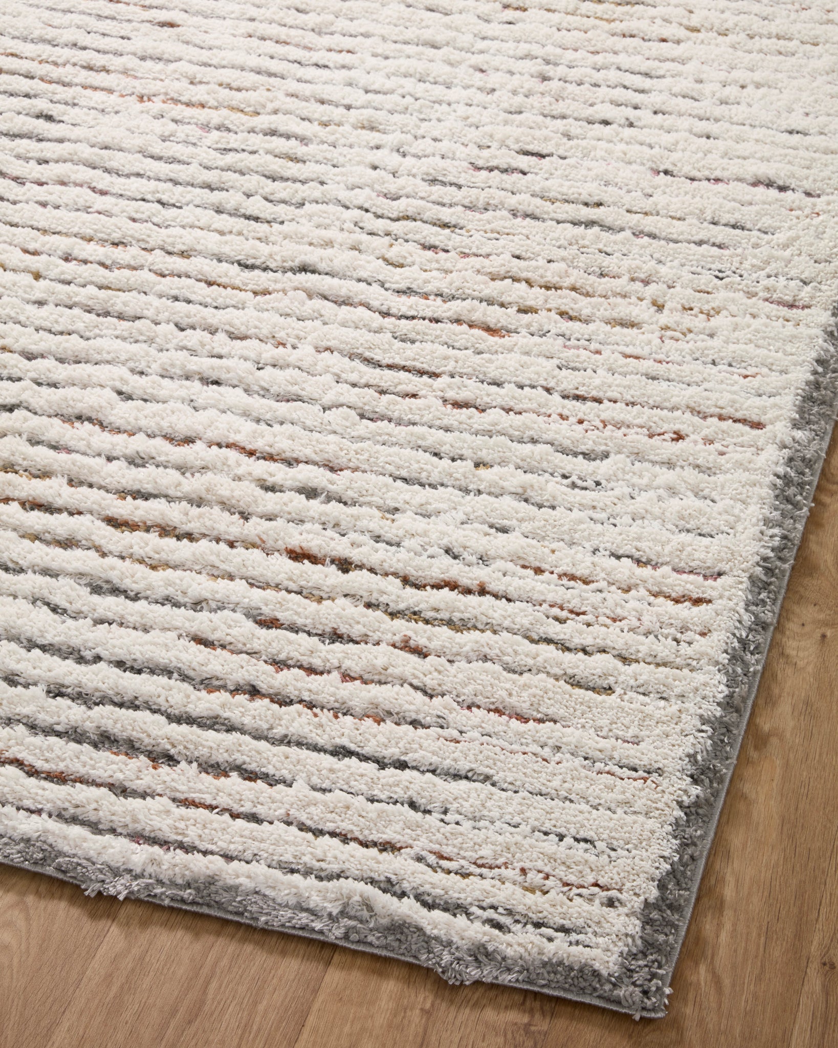 Levitt Shag Ivory / Multi shown from a different angle to reveal its pattern.