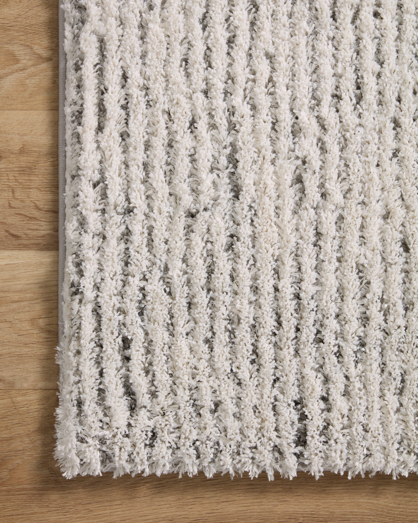 Levitt Shag Ivory / Grey shown from another angle.